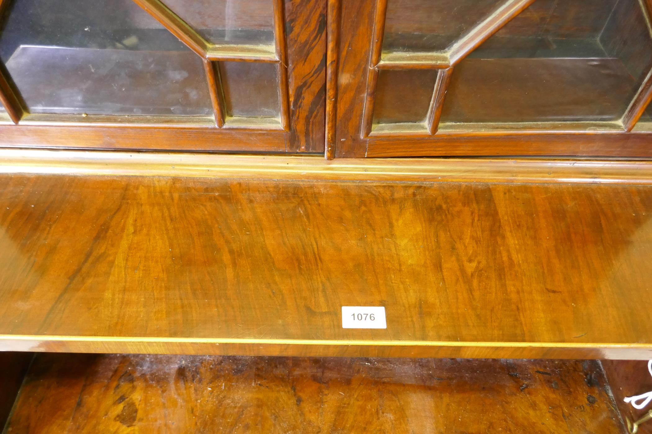 A C19th figured walnut secretaire bookcase, the astragal glazed upper section with adjustable - Image 5 of 7