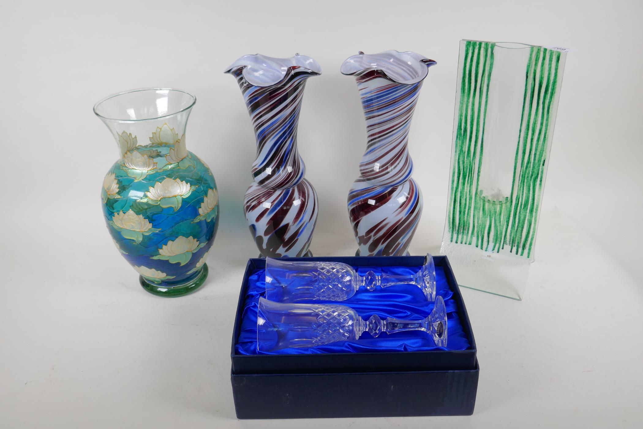 A studio glass specimen vase, 35cm high, a pair of swirled glass vases, an enamelled glass vase