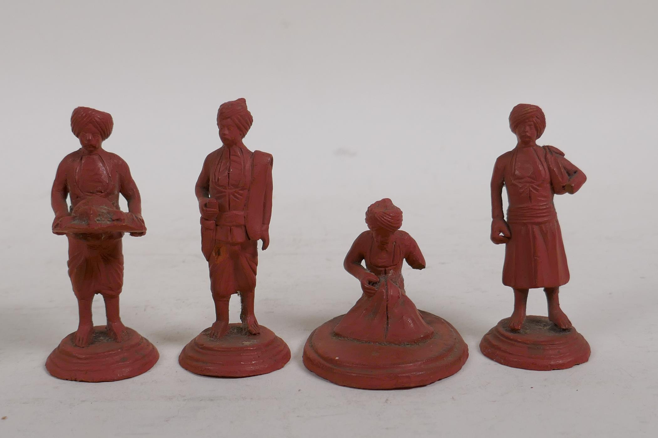 A collection of Indian terracotta figures depicting different trades people, some painted, largest - Image 5 of 5