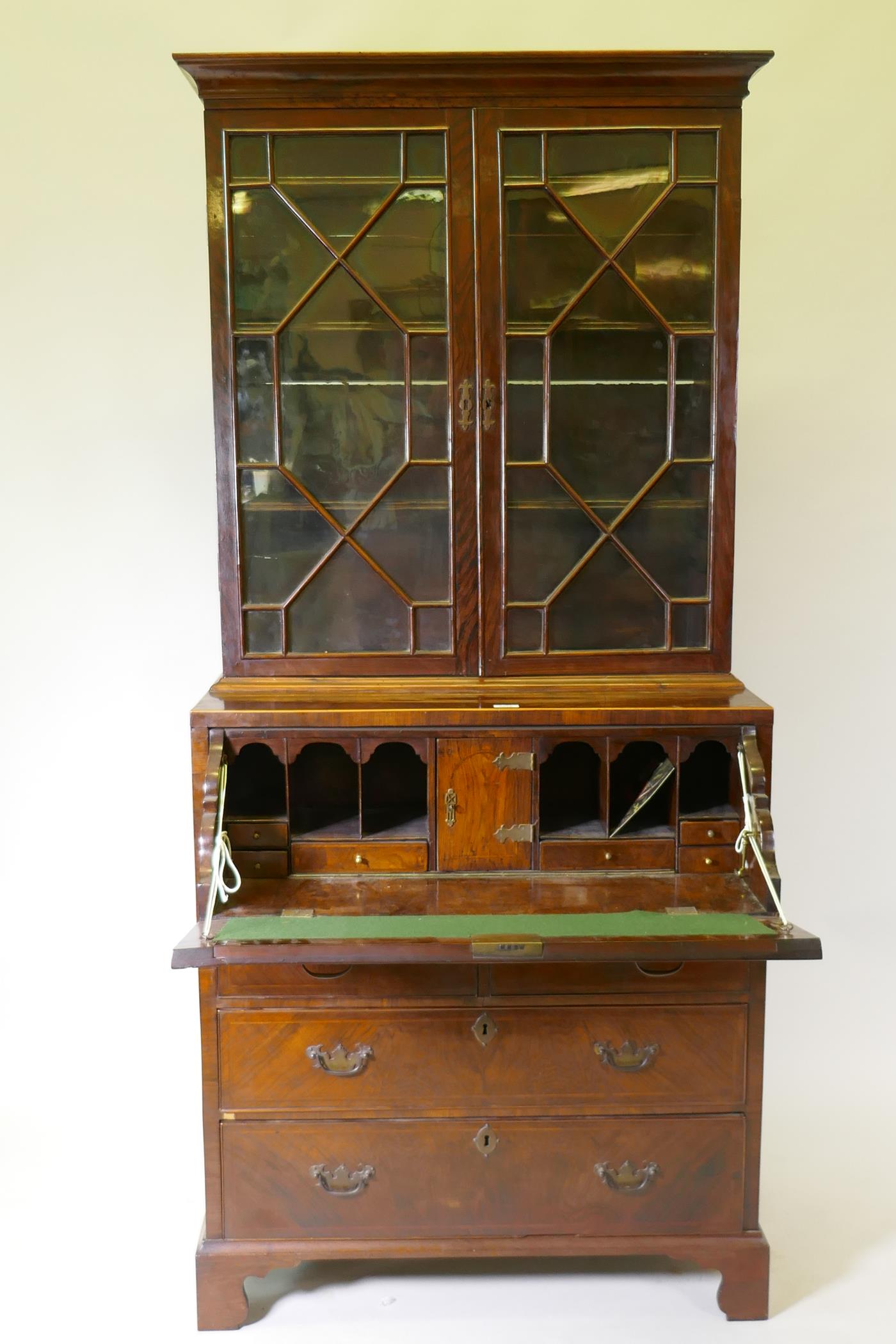 A C19th figured walnut secretaire bookcase, the astragal glazed upper section with adjustable - Image 7 of 7