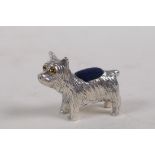 A sterling silver miniature pin cushion in the form of a dog, 3cm long