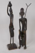 Two Benin bronze figures of a warrior and woman, 30cm high
