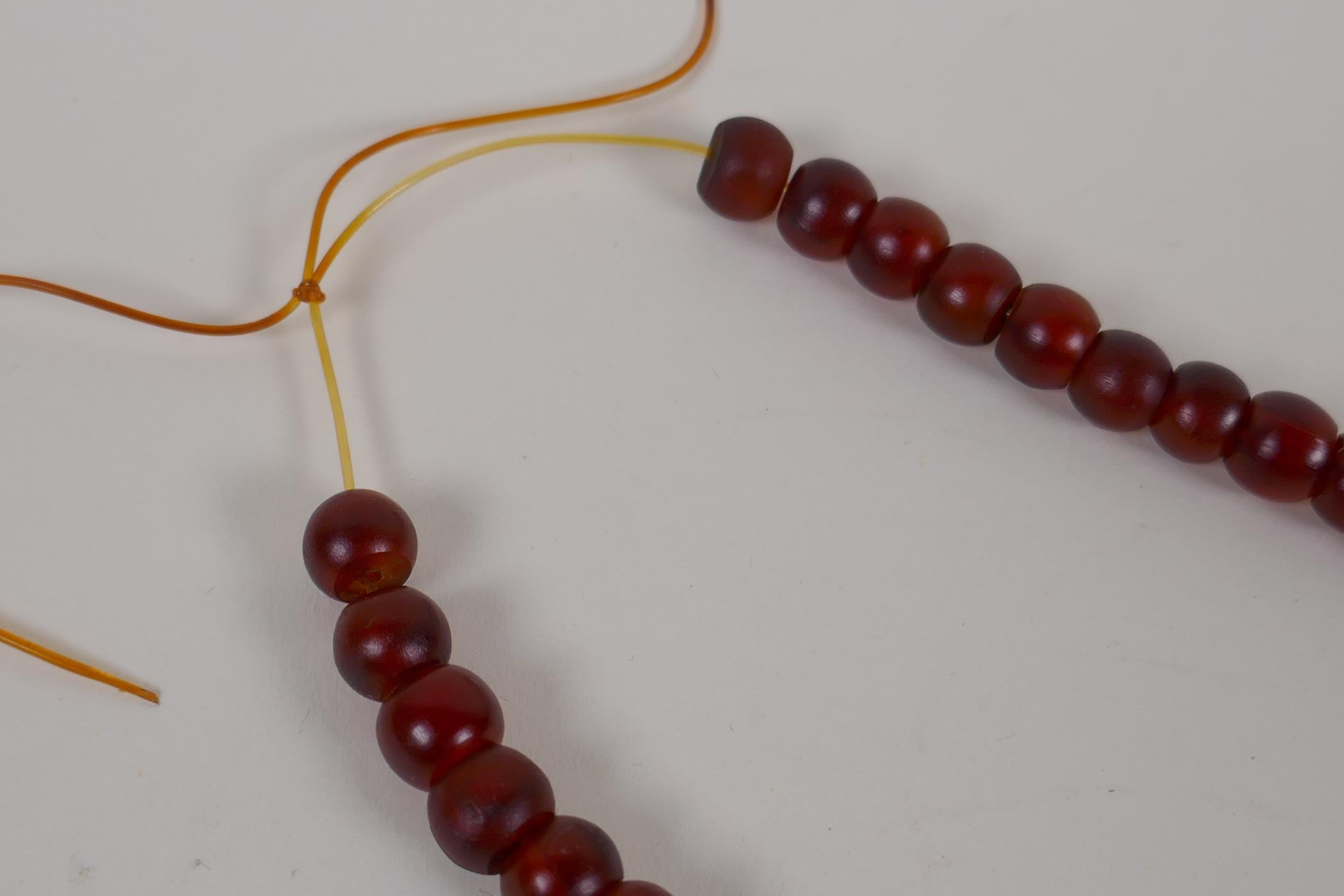 A string of horn beads, 88cm long - Image 4 of 4