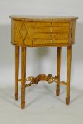 A C19th Dutch inlaid satinwood workbox, with lift up top and well, two false and two true drawers,