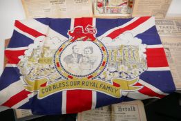 A collection of Royal Commemorative memorabilia including a Coronation flag and editions of Surrey