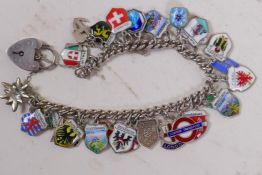 A silver charm bracelet set with enamel charms depicting national and city emblems