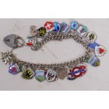 A silver charm bracelet set with enamel charms depicting national and city emblems