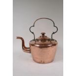 A C19th copper kettle, 33cms high
