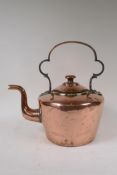 A C19th copper kettle, 33cms high