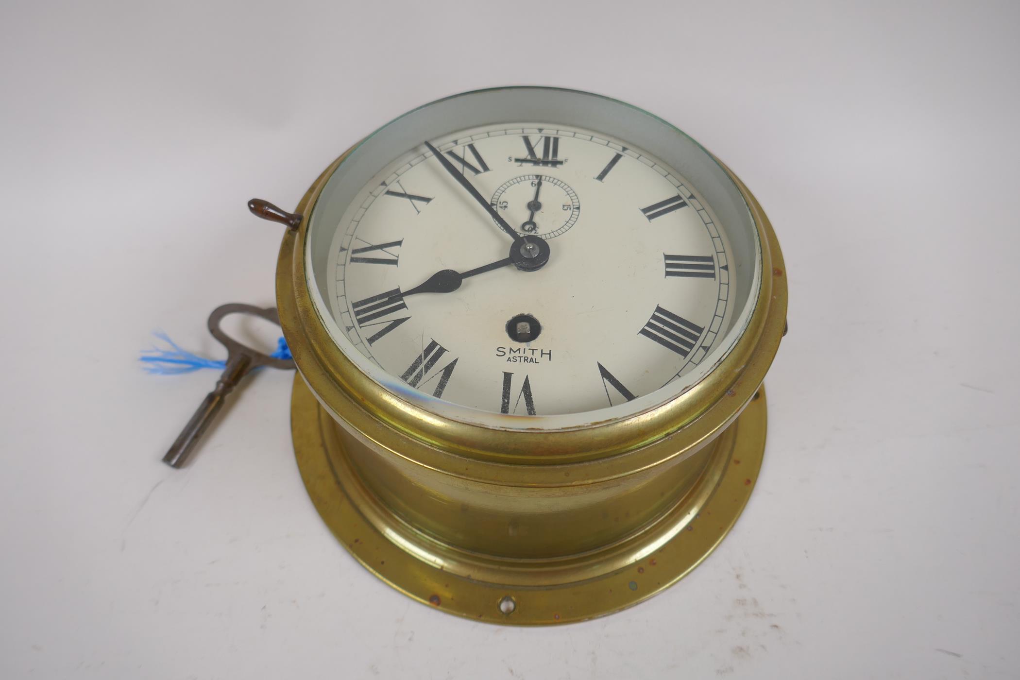 A mid C20th brass cased Smiths Astral bulk head ship's clock, 17cm diameter - Image 2 of 3