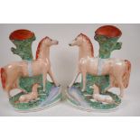 A pair of large Staffordshire flat back spill vases modelled as horses with foals, 30cm high