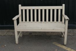 A painted hardwood garden bench with slatted back and seat, 120cm wide