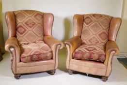 Pair of leather and textile upholstered wing back armchairs