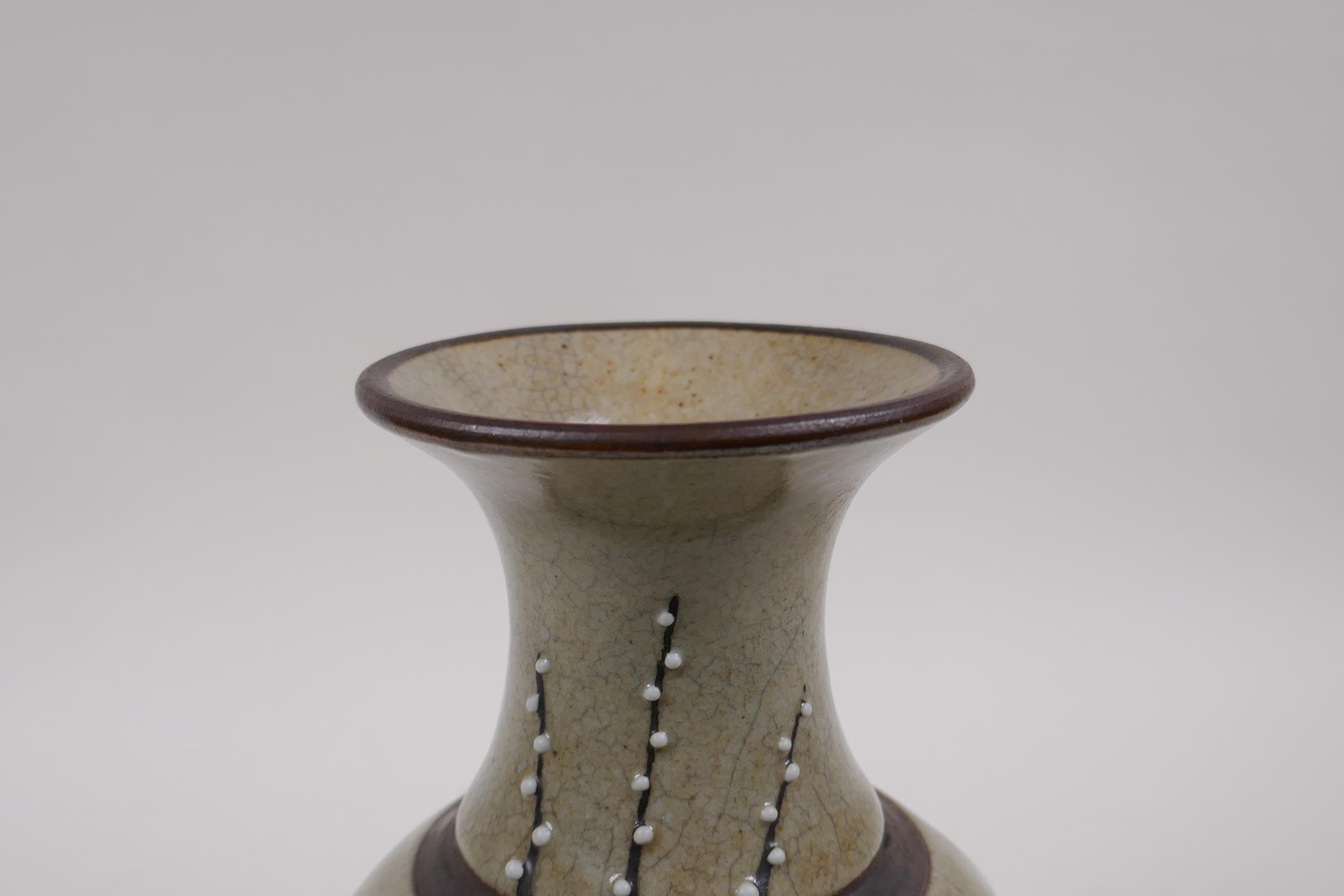 A Chinese celadon glazed porcelain vase with bronze style bands and prunus blossom decoration, - Image 5 of 5