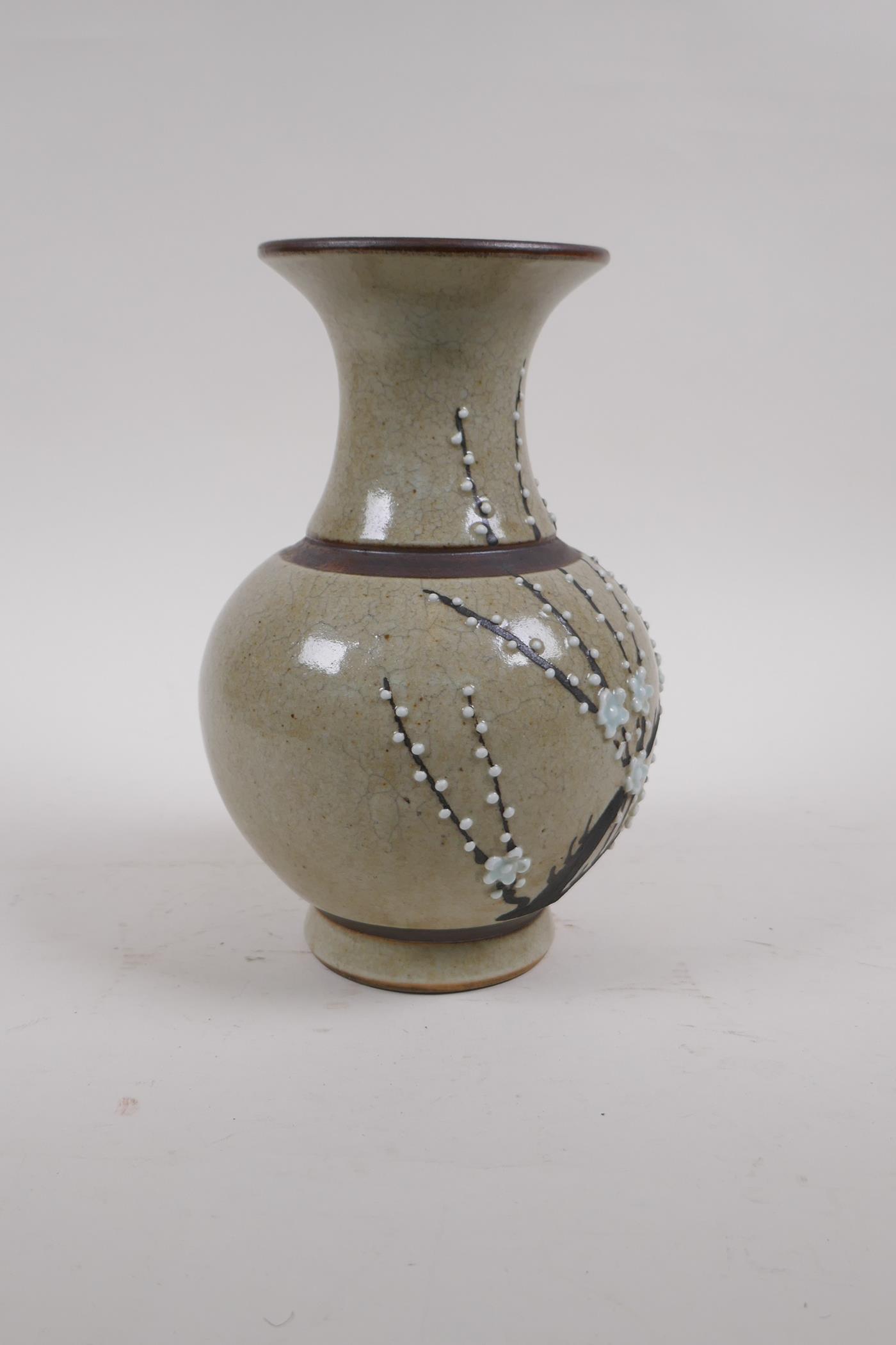 A Chinese celadon glazed porcelain vase with bronze style bands and prunus blossom decoration, - Image 4 of 5