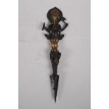 A Tibetan bronzed metal phurba, the handle in the form ofGanesh, 32cm long