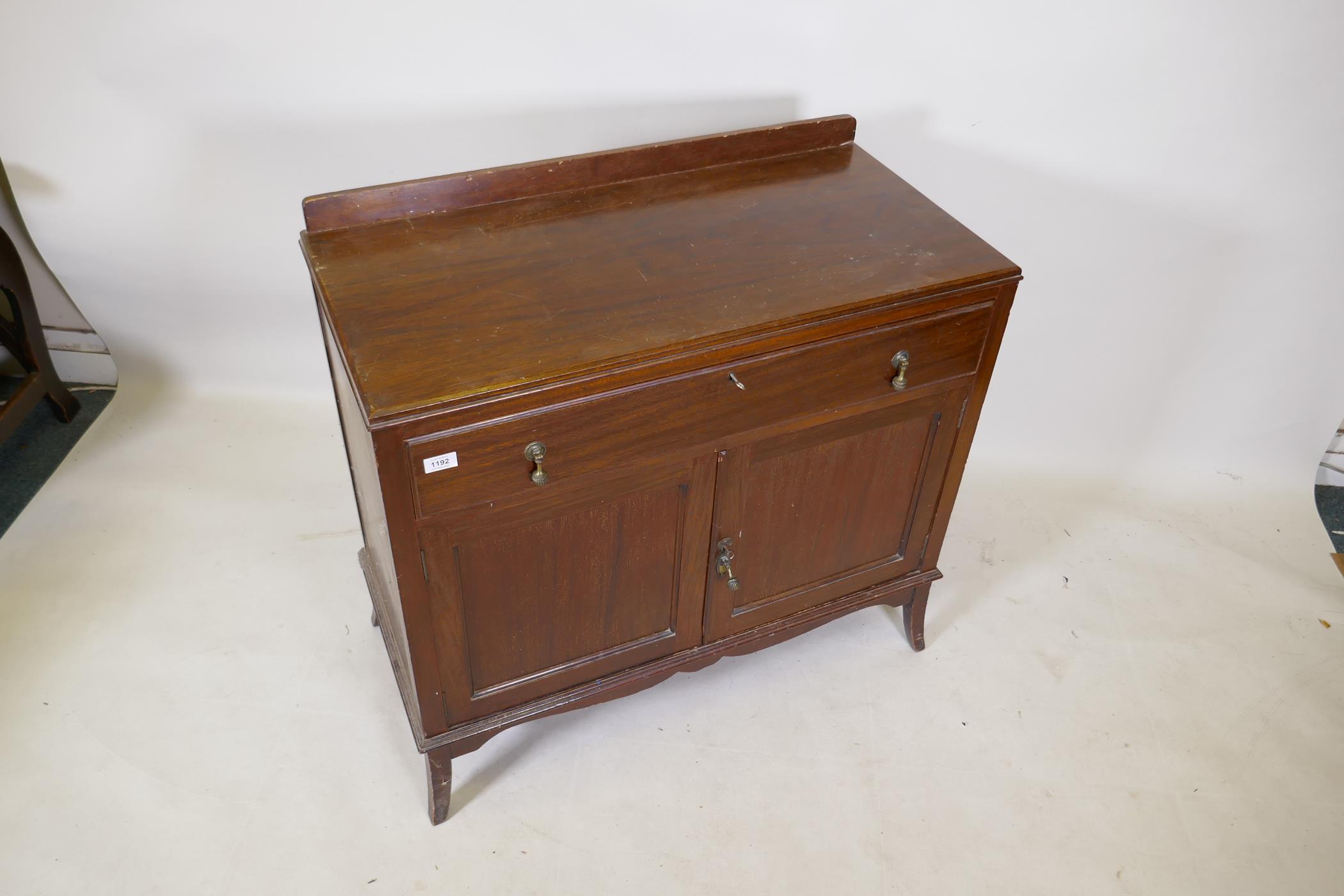 An Edwardian mahogany side cabinet with a single drawer over two cupboards, raised on swept - Image 2 of 2