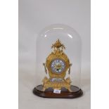 A French ormolu white metal mantel clock, the Sevres style porcelain dial and inset panel with