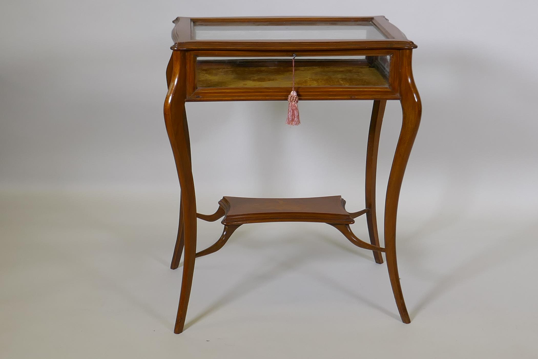 An Edwardian satinwood serpentine top bijouterie table, raised on shaped supports united by an - Image 2 of 3