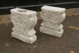 A pair of painted concrete garden bench supports, 39cm high