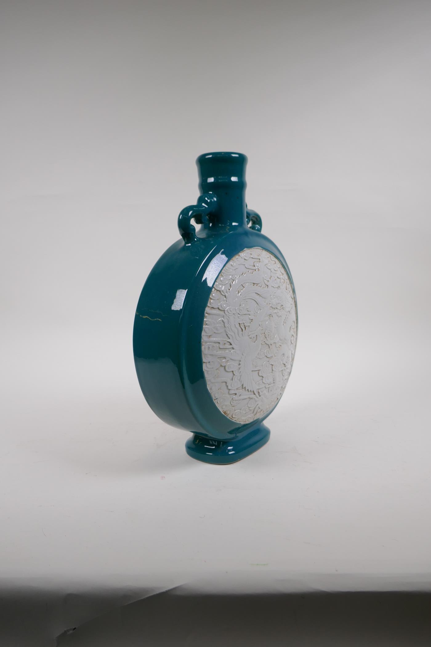 An emerald green glazed porcelain two handled moon flask with a white ground panel and raised dragon - Image 5 of 6