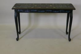 A painted side table, the top decorated in a William Morris inspired design, raised on cabriole