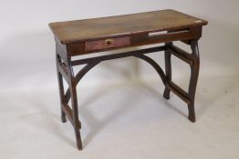 A C19th French oak work table, originally folding, now lacking a slide, 84 x 44 x 66cms
