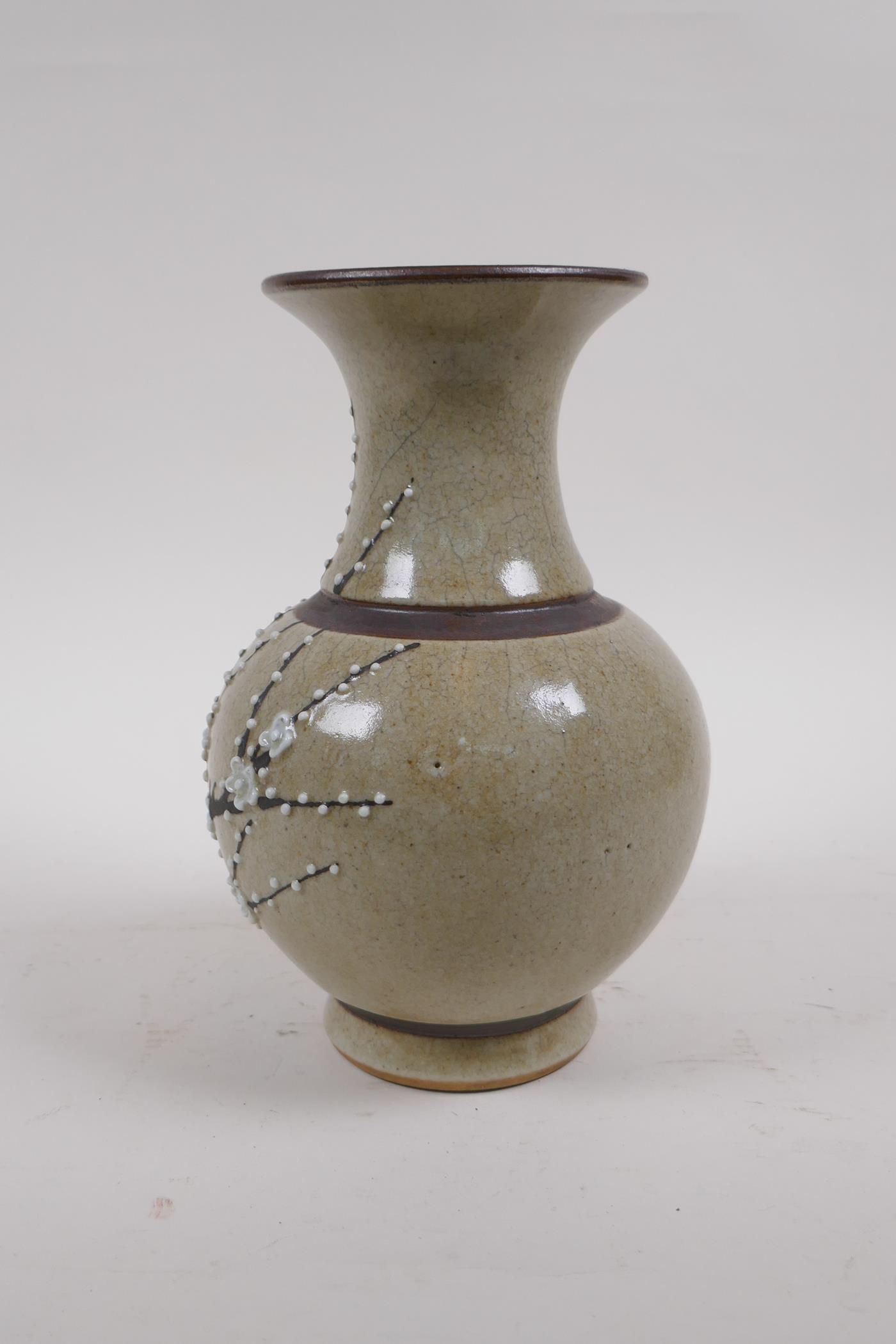 A Chinese celadon glazed porcelain vase with bronze style bands and prunus blossom decoration, - Image 2 of 5