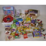 A collection of tin plate clockwork toys