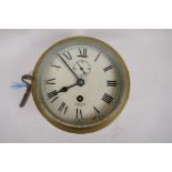 A mid C20th brass cased Smiths Astral bulk head ship's clock, 17cm diameter