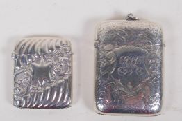 A hallmarked silver vesta case engraved with leaves, Birmingham 1890, a ribbed vesta case,