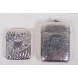 A hallmarked silver vesta case engraved with leaves, Birmingham 1890, a ribbed vesta case,