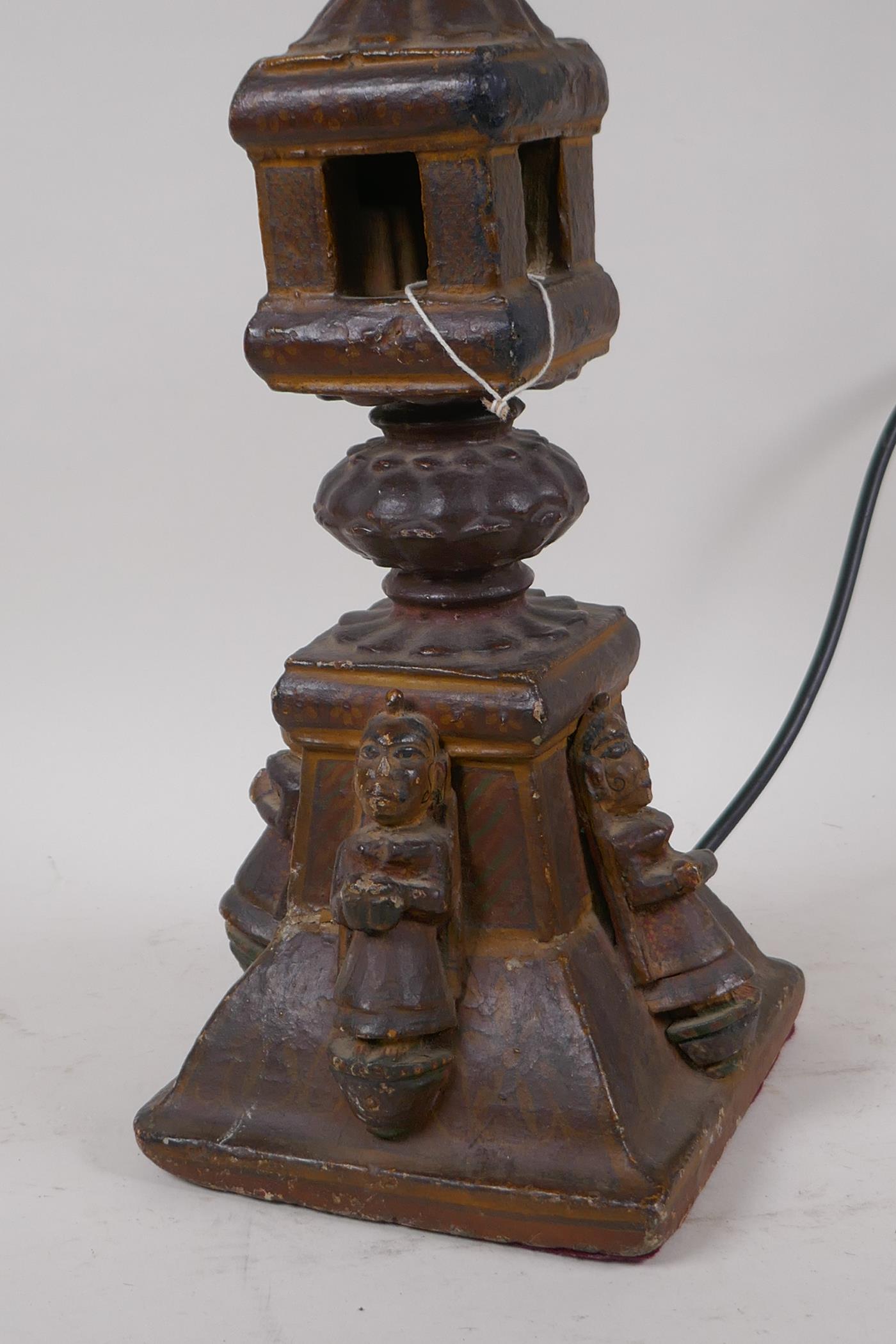 An Indian carved wood table lamp in the form of a temple with applied figural decoration, 44cm high - Image 3 of 4