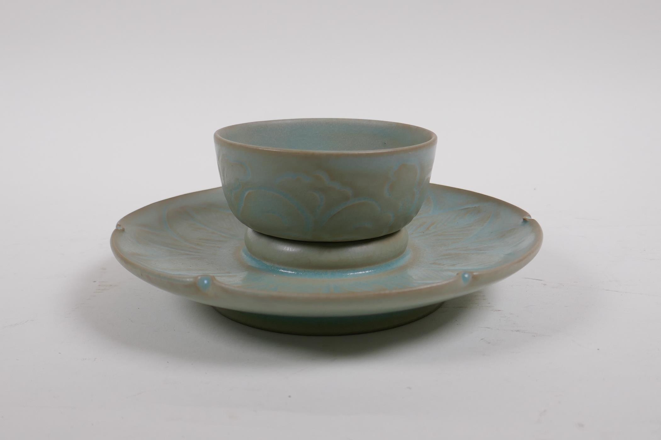 A Chinese Ru ware style celadon glazed tea bowl and saucer with incised petal decoration, 18cm - Image 3 of 4