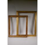 An early C19th giltwood moulding picture frame, and a gilt composition picture frame with gadroon