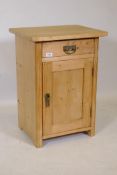 A continental pine bedside cupboard with drawer over single door, 40 x 50cms, 70cm high