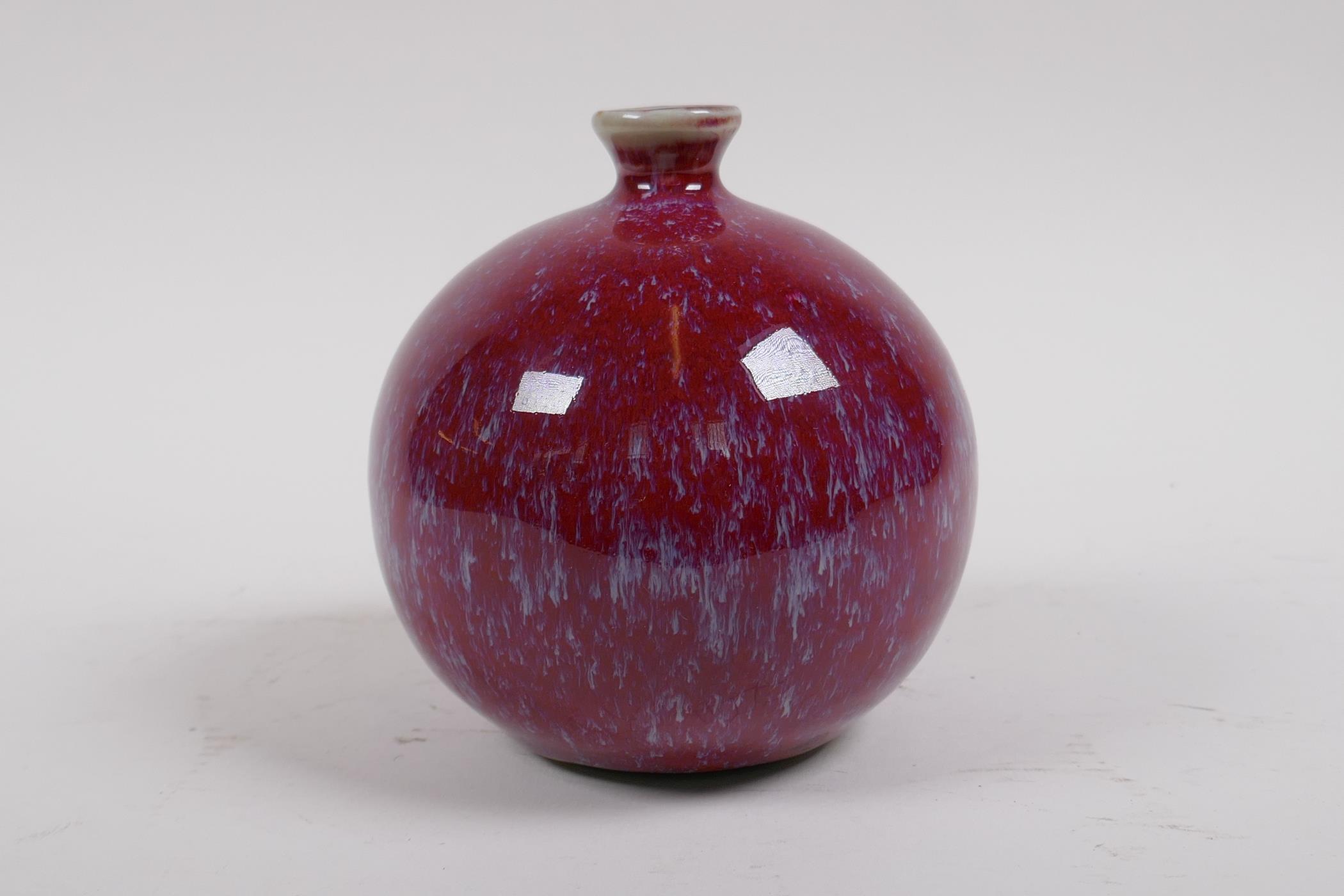 A Chinese flambe glazed porcelain pomegranate shaped bud vase, 12cm high - Image 2 of 4