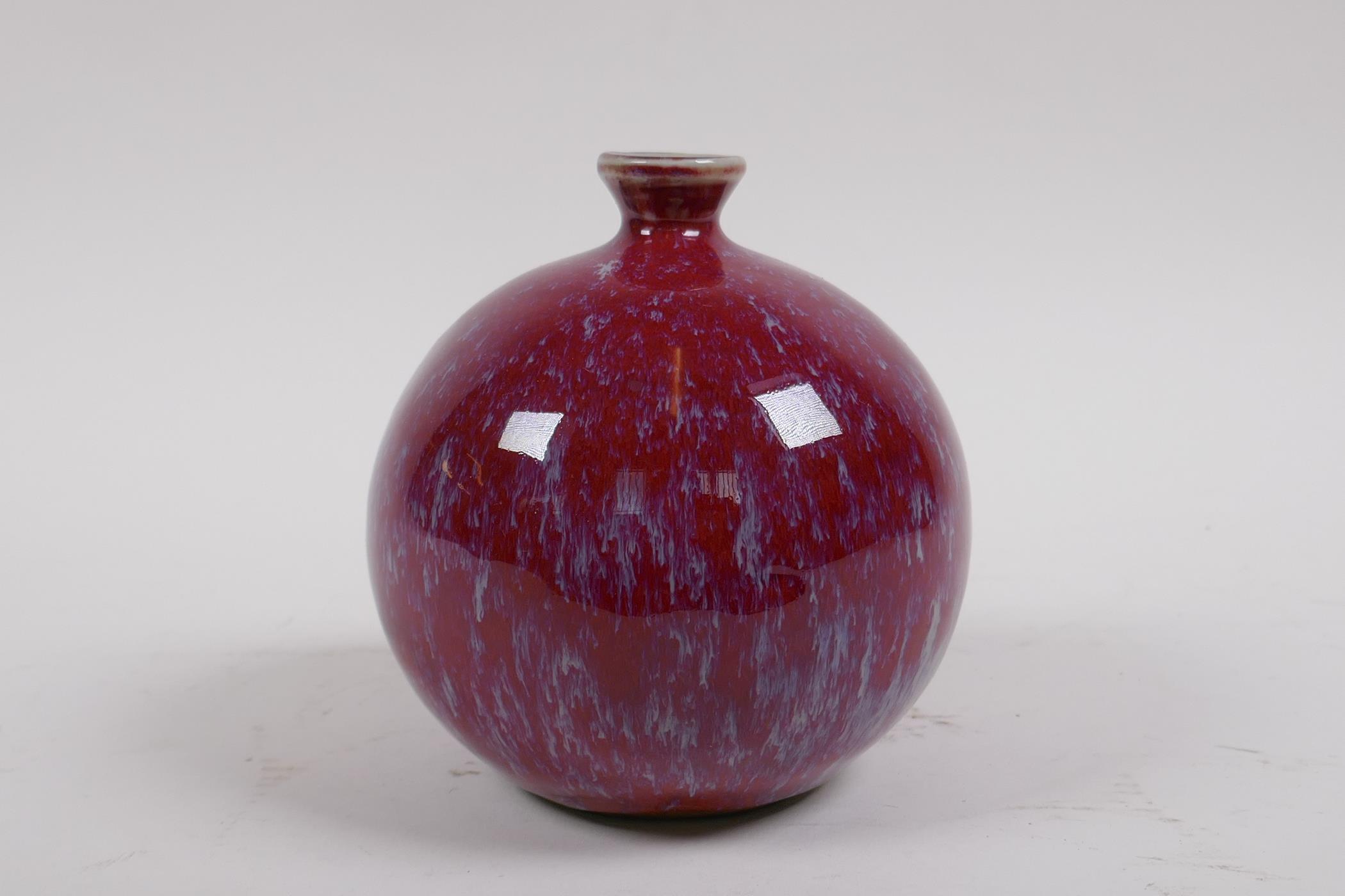 A Chinese flambe glazed porcelain pomegranate shaped bud vase, 12cm high - Image 3 of 4