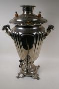 A silver plated samovar on a pedestal base, 57cm high