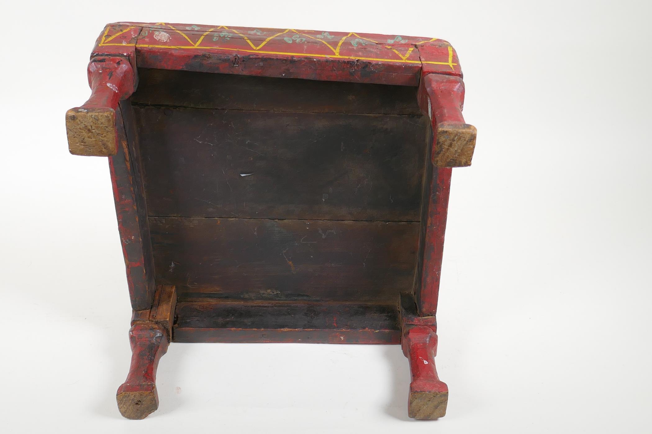 An antique painted footstool, 17cm high, 29cm square - Image 4 of 5