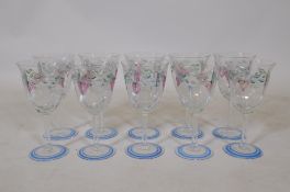 A set of ten Orrefors Maja pattern wine glasses, with hand painted decoration by Eva Englund and