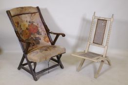 A C19th walnut open arm chair and a folding steamer type chair