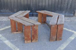 A pair of teak corner seats, 44cm high, 117cm wide