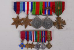A set of military WWII medals including a Croix de Guerre with star and a set of miniatures
