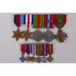 A set of military WWII medals including a Croix de Guerre with star and a set of miniatures