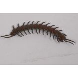 An oriental bronze okimono formed as an articulated centipede, 15cm long