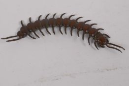 An oriental bronze okimono formed as an articulated centipede, 15cm long