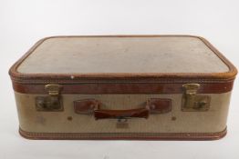 A mid century Madler Stratobox suitcase, with stitched leather trim, AF damage to back corner, 56