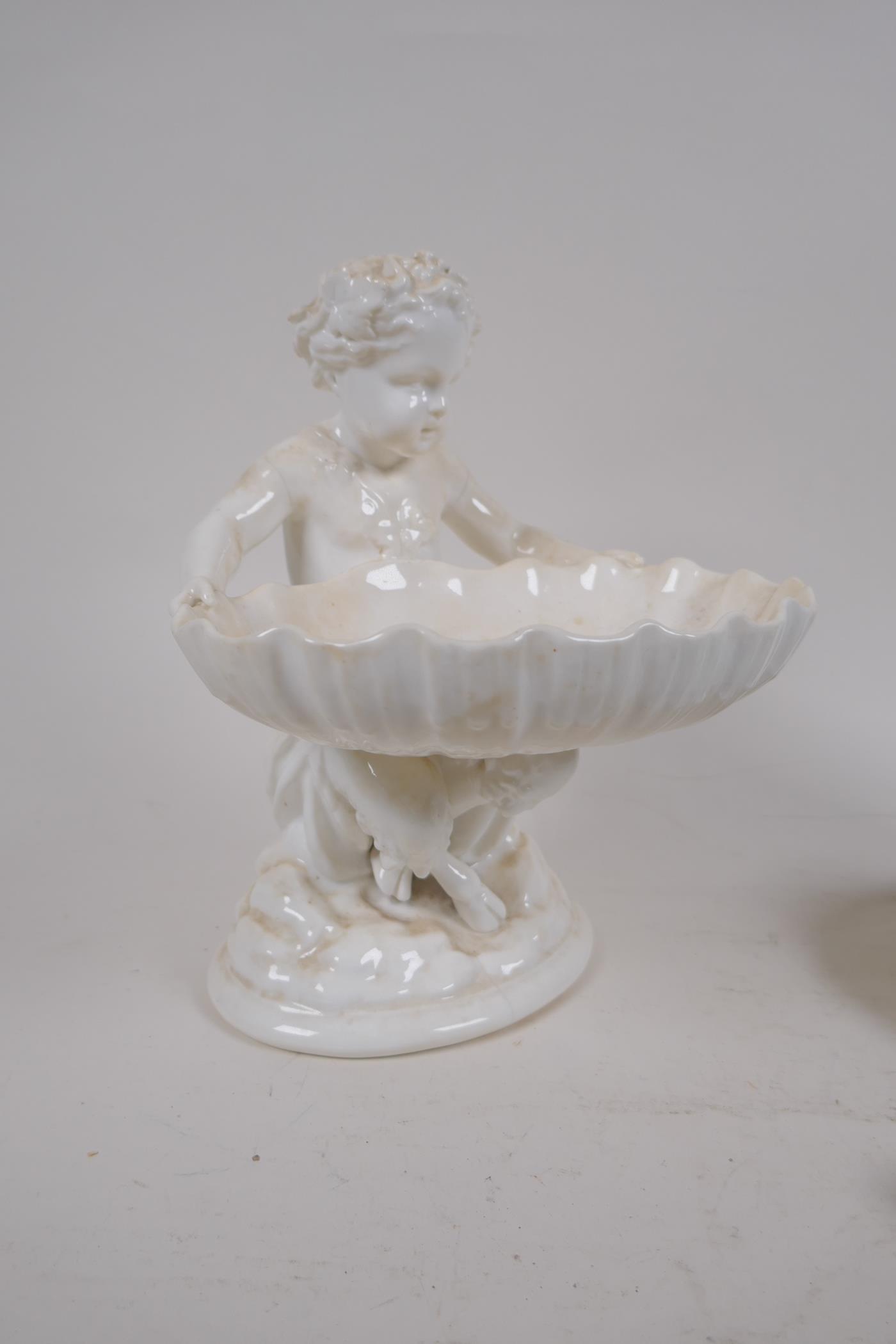 A C19th Minton parian ware bonbon dish in the form of a satyr holding a shell, a pair of C19th - Image 2 of 8