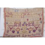 A small sampler dated 1883 by Margaret Lynch, 23 x 16cms